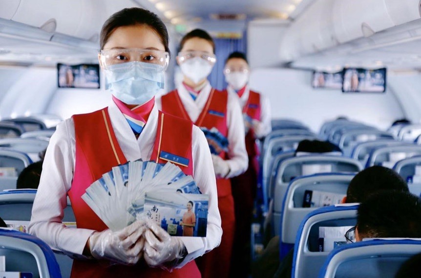 Number of new Covid-19 cases drops to single digits in China, but Beijing limits flights from affected provinces
