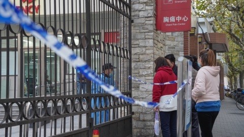 Three Covid cases in Shanghai lead to lockdowns, school closures and flight cancelations